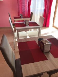 A seating area at Color House Malpensa B&B