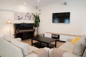 TV a/nebo společenská místnost v ubytování Hotel Trieste