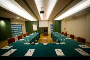 The business area and/or conference room at Athinais Hotel
