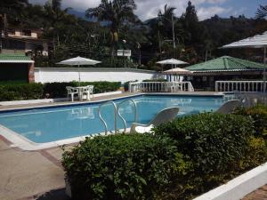 Bazén v ubytování Hotel Villa Paz nebo v jeho okolí