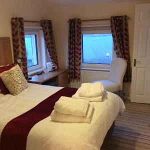 Letto o letti in una camera di Roundstone Retreats Islandview