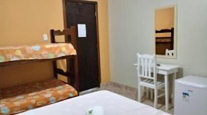 Postel nebo postele na pokoji v ubytování Pousada da Rose Paraty