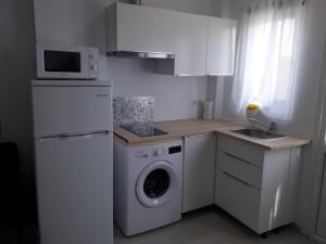 Kuchyňa alebo kuchynka v ubytovaní Apartamento faro Puerto Sherry