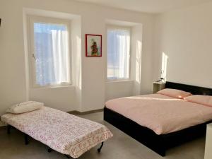 A bed or beds in a room at Casa Cesira