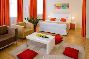 Postel nebo postele na pokoji v ubytování Mamaison Residence Sulekova Bratislava