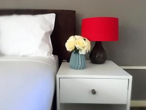 Postel nebo postele na pokoji v ubytování Parkdale Motor Inn