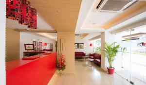 Posezení v ubytování Red Fox by Lemon Tree Hotels, Tiruchirappalli Trichy