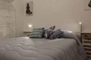 Un pat sau paturi într-o cameră la u ficupala