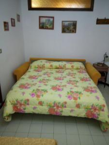 Posteľ alebo postele v izbe v ubytovaní La Casetta sul Corso