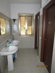 Vonios kambarys apgyvendinimo įstaigoje Ostello Bella Calabria