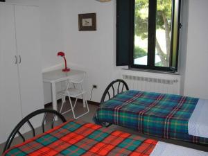 A bed or beds in a room at Casaleaurelia