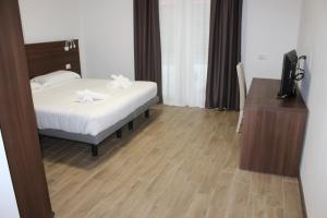 Hotel Bocciolo客房内的一张或多张床位
