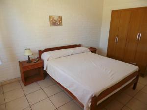 Кровать или кровати в номере Alquileres Piriapolis