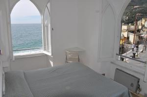 Postel nebo postele na pokoji v ubytování Hotel Meublè Agavi