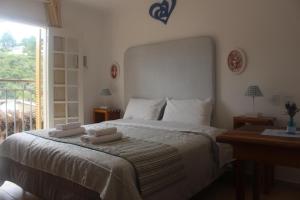 Postel nebo postele na pokoji v ubytování Casarão da Ducha hotel concept