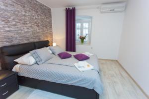 Posteľ alebo postele v izbe v ubytovaní Apartments Villa Sol