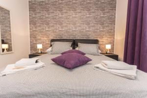 Posteľ alebo postele v izbe v ubytovaní Apartments Villa Sol