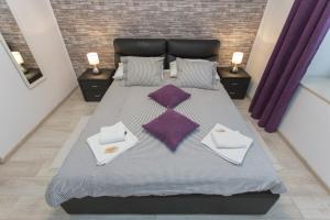 Posteľ alebo postele v izbe v ubytovaní Apartments Villa Sol