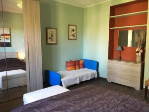 A bed or beds in a room at Villa Culla di Jana