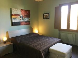 A bed or beds in a room at Villa Culla di Jana
