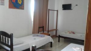 Postel nebo postele na pokoji v ubytování Hotel HB