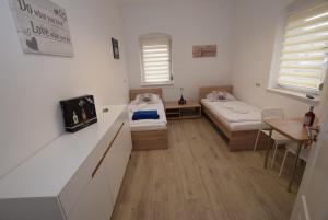 Llit o llits en una habitació de Monteurzimmer Kirchheim-Teck