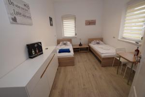 Ένα ή περισσότερα κρεβάτια σε δωμάτιο στο Monteurzimmer Kirchheim-Teck