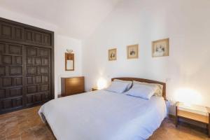 Postel nebo postele na pokoji v ubytování Vivienda Vacacional Casetta Volante