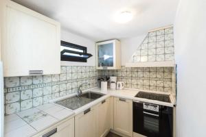 Kuchyň nebo kuchyňský kout v ubytování Vivienda Vacacional Casetta Volante + 6 fotografií