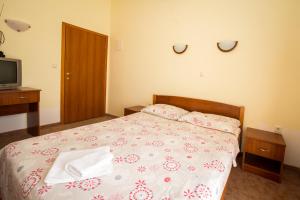 Letto o letti in una camera di Bed and Breakfast Helena