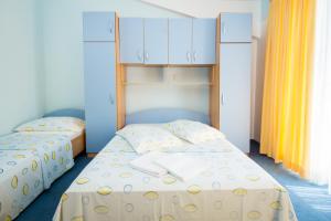 Letto o letti in una camera di Bed and Breakfast Helena