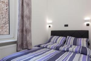 Posteľ alebo postele v izbe v ubytovaní Core Apartments Zagreb