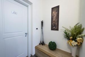 Foto Menaggios asuva majutusasutuse Hotel Garni Corona galeriist