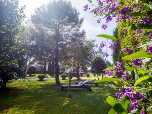 A garden outside Hotel Rural Cabo Busto