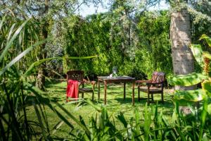 A garden outside Hotel Rural Cabo Busto