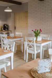 Reštaurácia alebo iné gastronomické zariadenie v ubytovaní Willa Malinka Wisła