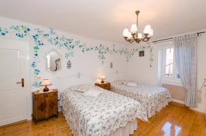 Postel nebo postele na pokoji v ubytování Casa Paola