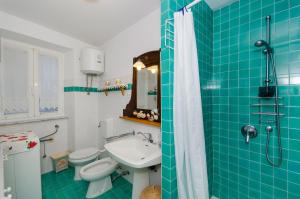 Koupelna v ubytování Casa Paola + 35 fotografií