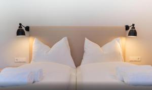 Posteľ alebo postele v izbe v ubytovaní Kitzbuheler Alpen Penthouse Hollersbach