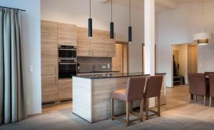 Kuchyňa alebo kuchynka v ubytovaní Kitzbuheler Alpen Penthouse Hollersbach
