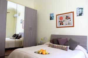 Ένα ή περισσότερα κρεβάτια σε δωμάτιο στο La Casa Di Tufo