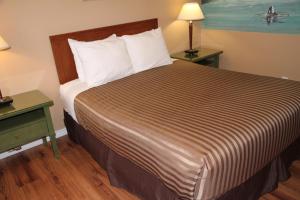 Postel nebo postele na pokoji v ubytování Hotel Squamish