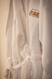 a close up of a white shirt with a collar at Hostal Boutique Plaza Cantarero in Nerja