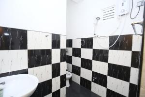 Koupelna v ubytování Isuru Homestay