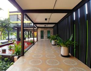 Foto de la galería de GREEN HOUSE Neo-Resotel en Nakhon Si Thammarat