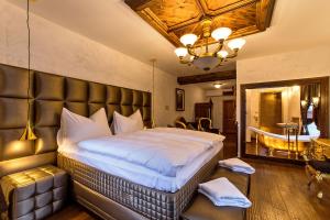 Postel nebo postele na pokoji v ubytování Arcadie Hotel & Apartments