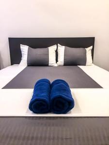 Postel nebo postele na pokoji v ubytování US Motel Colombo