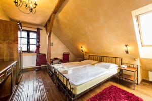 Postel nebo postele na pokoji v ubytování Arcadie Hotel & Apartments