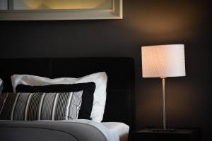 Postel nebo postele na pokoji v ubytování Boutique-Hotel Antica Posta