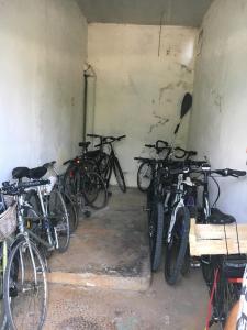 a group of bikes parked in a garage at Le Studio Rivage - Surplombant le lac in Duingt